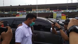Kenakan Masker, Ajudan Wali Kota Digiring Penyidik Keluar Dari Polrestabes Medan