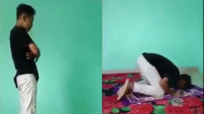 Viral, Pemuda Ini Lakukan Gerakan Salat Sambil Menghisap Rokok