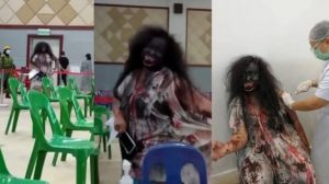 Pake Kostum Hantu, Wanita Ini Datangi Pusat Vaksin Covid-19