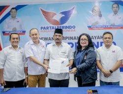 Perindo Resmi Menyerahkan Surat Tugas Kepada Rahudman Harahap untuk Maju di Pilkada Medan